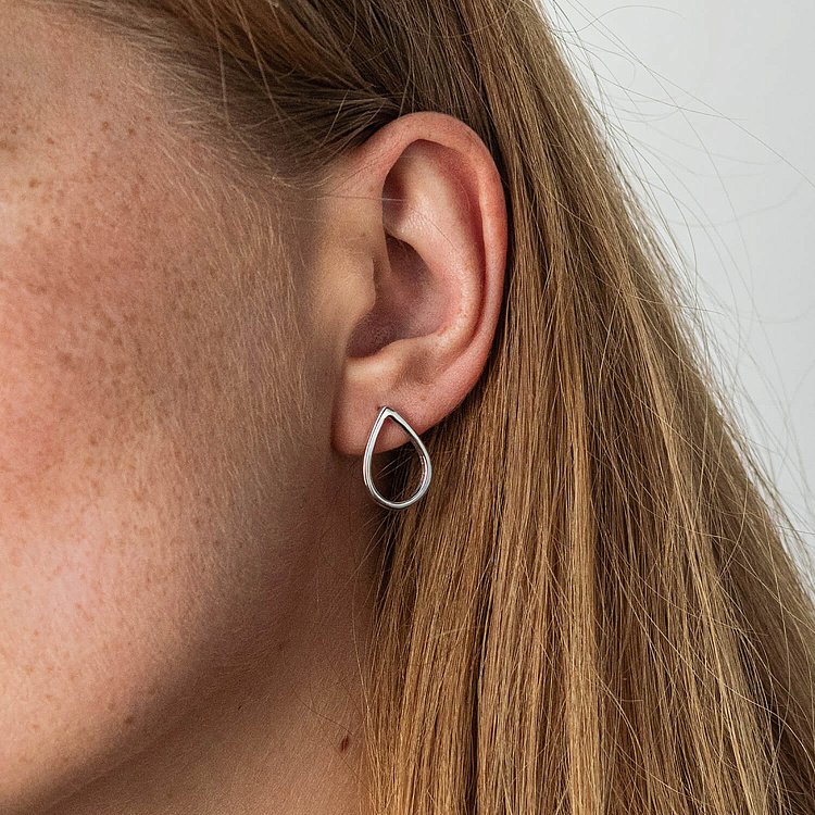 Сережки-пусети "Великі крапельки" в білому золоті с06410 від ювелірного магазину Онікс - 1