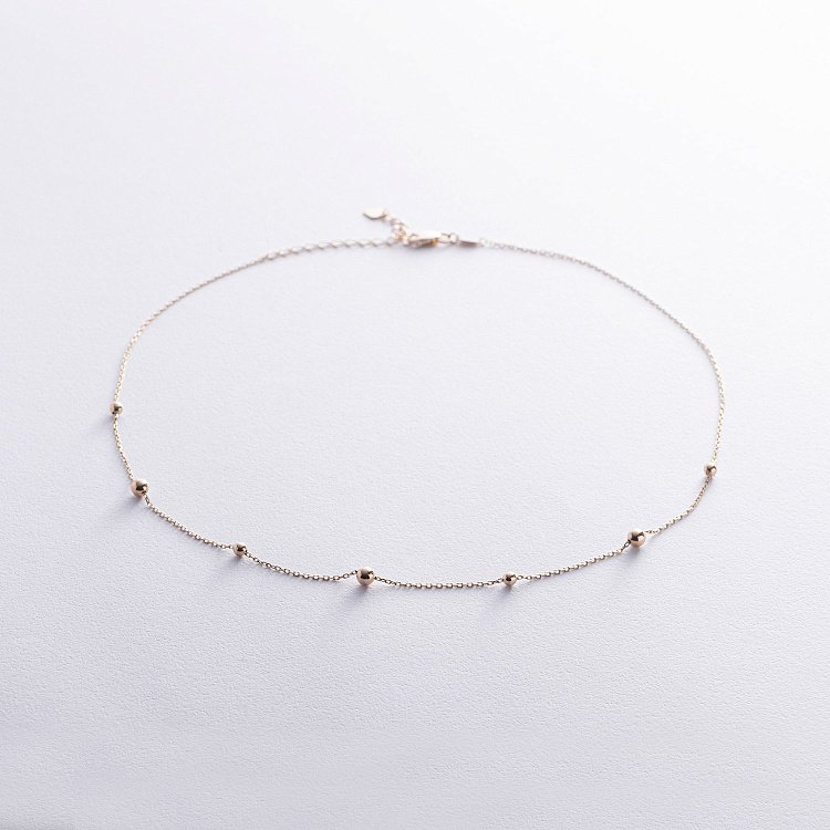 Кольє "Кульки" у жовтому золоті кол02457 від ювелірного магазину Онікс