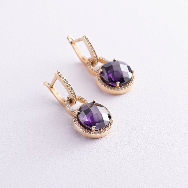 Ексклюзивні золоті сережки з фіанітами с03534 від ювелірного магазину Онікс