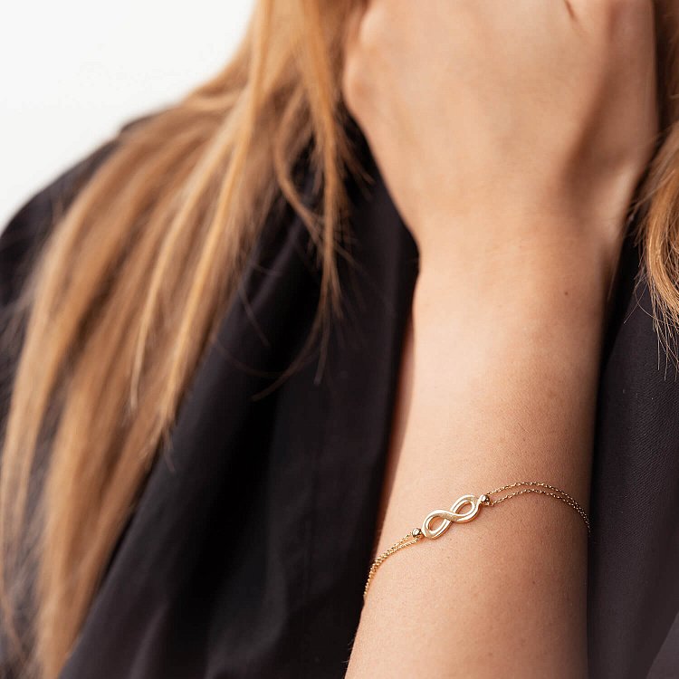 Браслет "Бесконечность" в желтом золоте б05101 от ювелирного магазина Оникс - 1