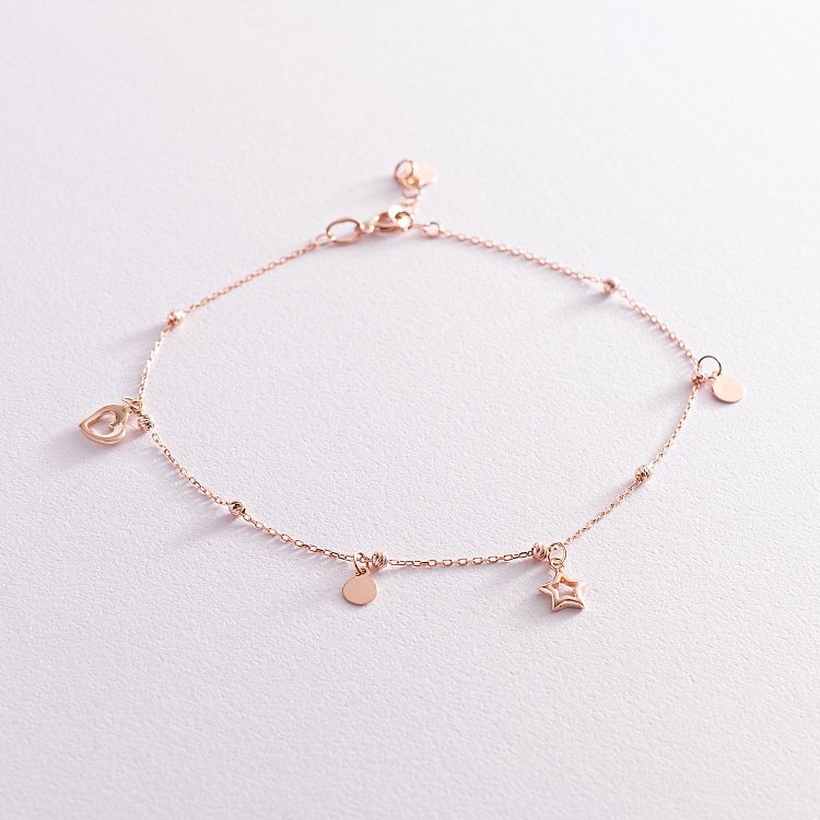 Золотий браслет "Сердечко і зірочка" на ногу б04347 від ювелірного магазину Онікс