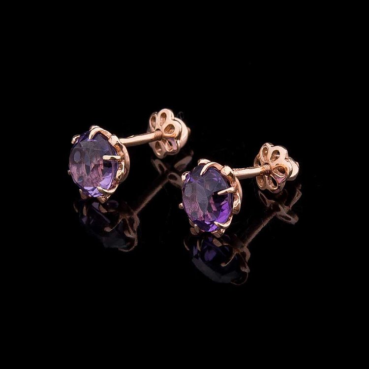 Золоті сережки-пусети з аметистом с01573 від ювелірного магазину Онікс