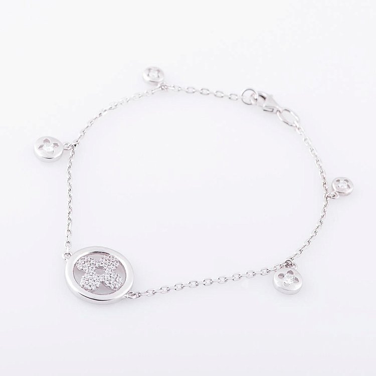 Золотий браслет "Конюшина" з фіанітами б02748 від ювелірного магазину Онікс