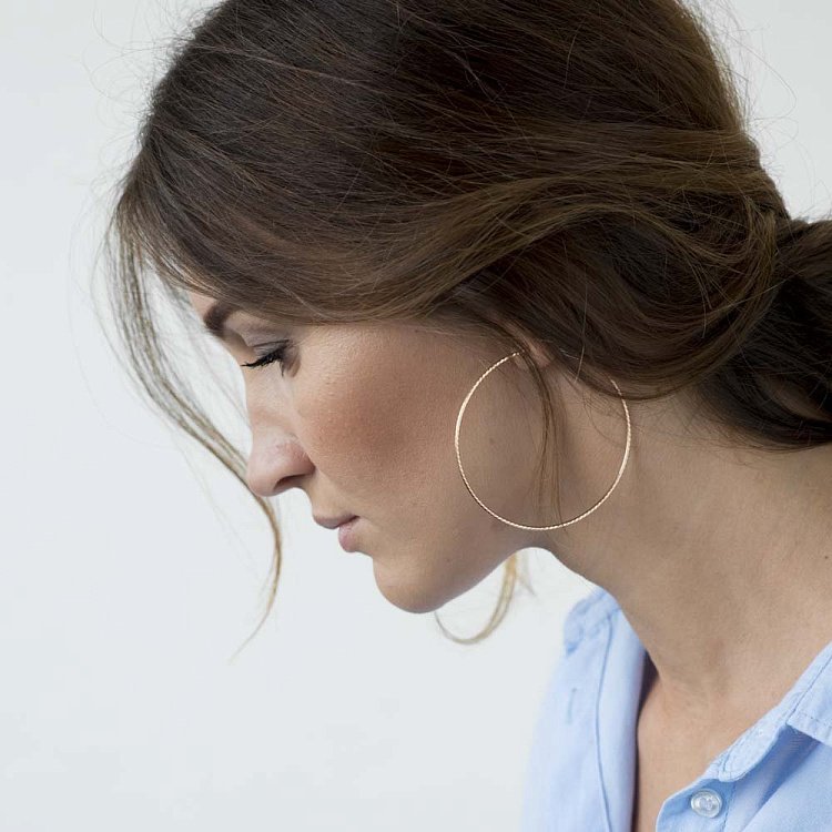 Золоті сережки кільця с00287 від ювелірного магазину Онікс