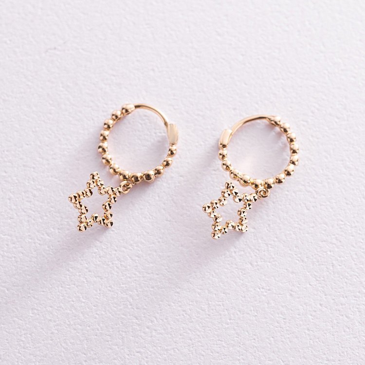 Золоті сережки "Зірочки" с07600 від ювелірного магазину Онікс