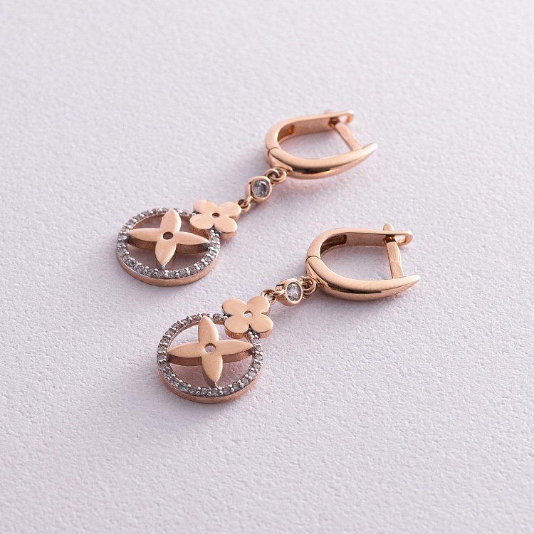 Золотые серьги "Клевер" с фианитами с04816 от ювелирного магазина Оникс