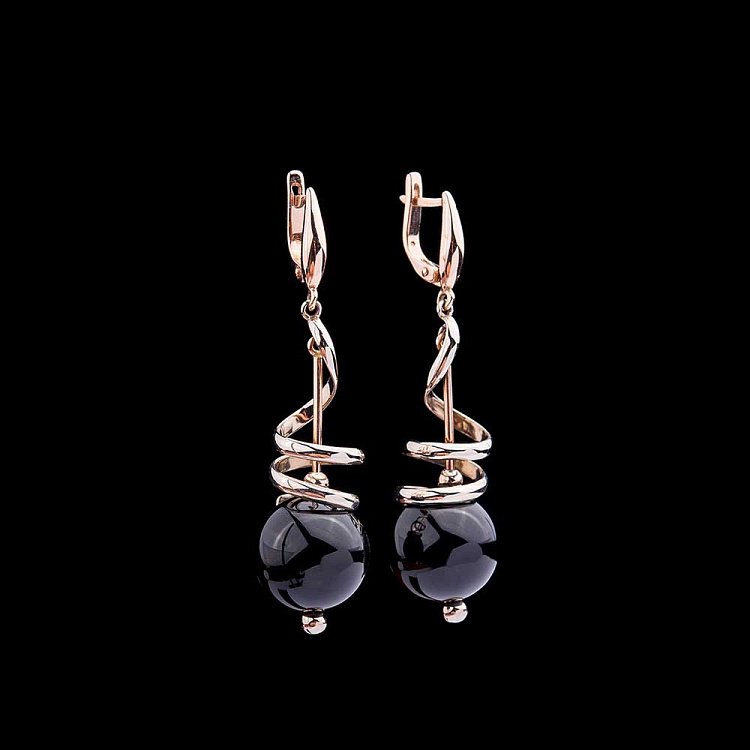 Золоті сережки з чорним агатом 459107 від ювелірного магазину Онікс