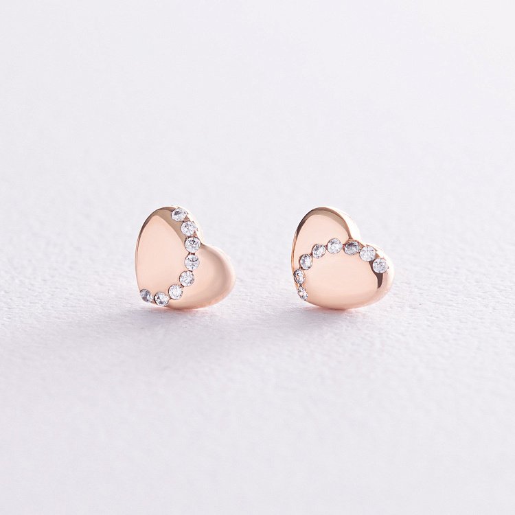 Золотые серьги - пусеты "Сердечки" с фианитами с08173 от ювелирного магазина Оникс