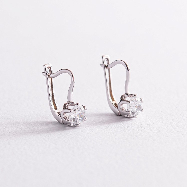 Золоті сережки з фіанітами с05963 від ювелірного магазину Онікс