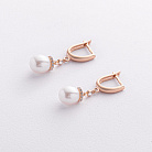 Золотые серьги с жемчугом и фианитами с09690 от ювелирного магазина Оникс - 1