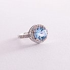 Серебряное кольцо с голубым топазом и фианитами 111430 от ювелирного магазина Оникс