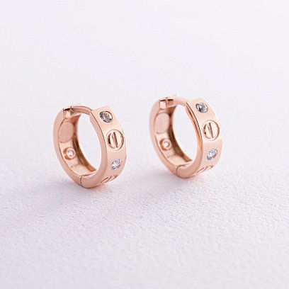 Золоті сережки - кільця "Love" з фіанітами с08143