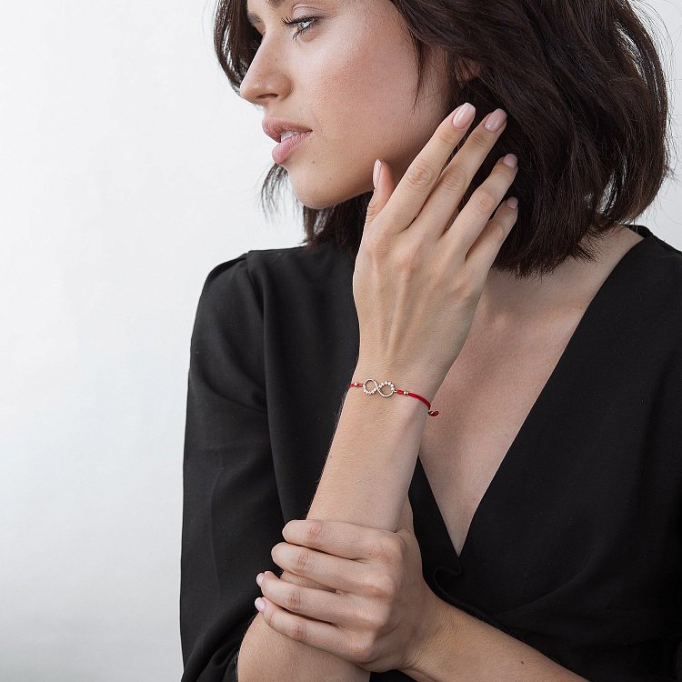 Браслет з червоною ниткою "Нескінченність" б02864 від ювелірного магазину Онікс - 1