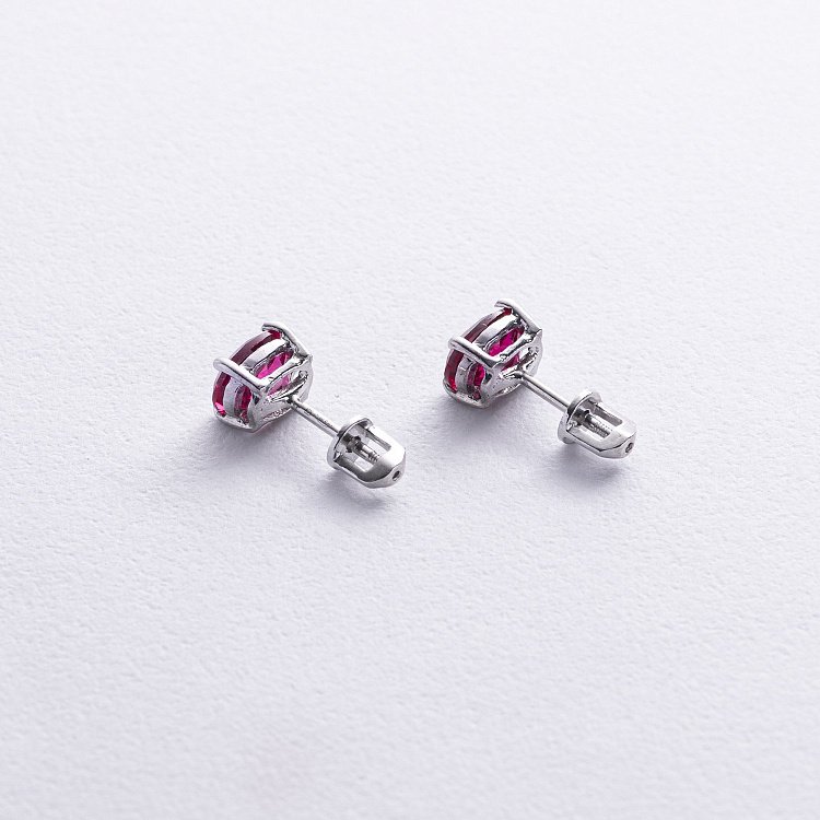 Срібні сережки - пусети (синт. рубіни) 121961 від ювелірного магазину Онікс - 2