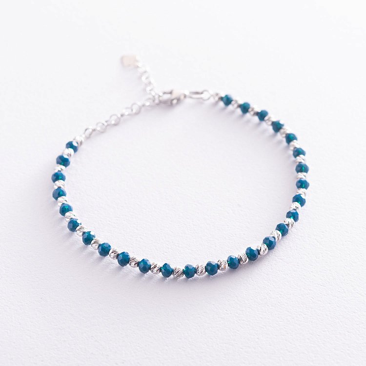 Срібний браслет з штучним лазуритом 141514 від ювелірного магазину Онікс