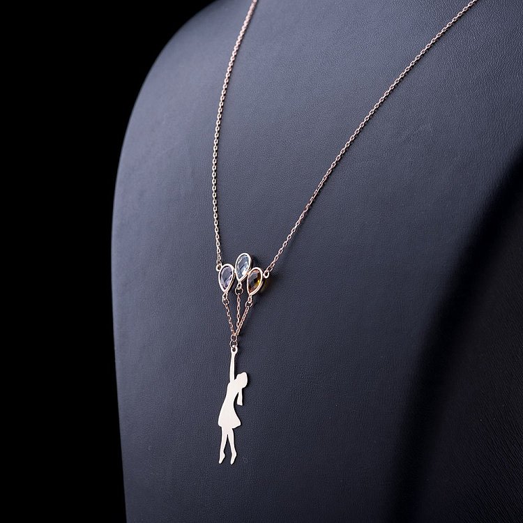 Золоте кольє "Дівчинка з кульками" з натуральними каменями кол01026 від ювелірного магазину Онікс