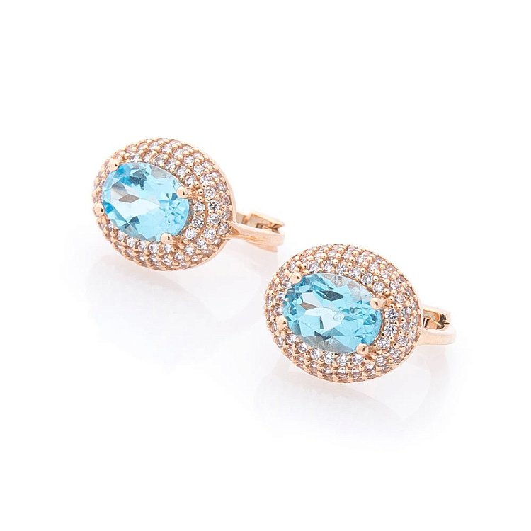 Золоті сережки з блакитним топазом і фіанітами с04198 від ювелірного магазину Онікс