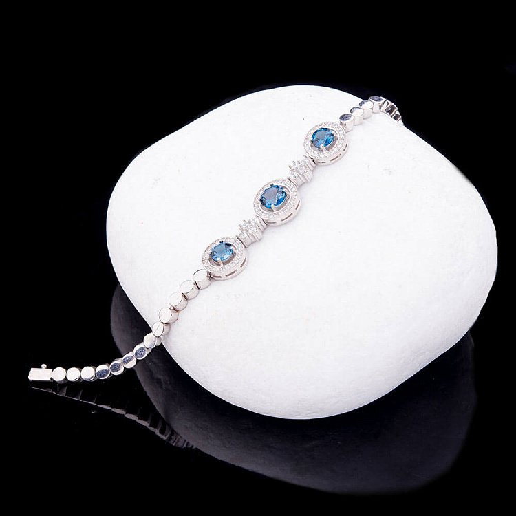 Срібний браслет з топазом "Лондон блакитний" 14804 від ювелірного магазину Онікс - 1