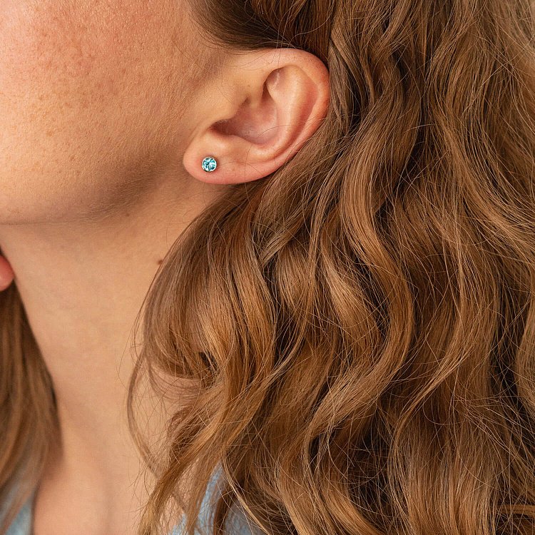 Золоті сережки - пусети з блакитними топазами сб0428gl від ювелірного магазину Онікс - 5