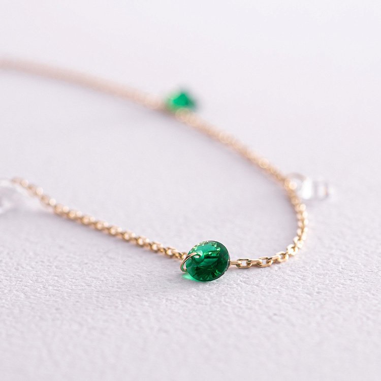 Браслет у жовтому золоті (зелені та білі фіаніти) б05138 від ювелірного магазину Онікс - 2