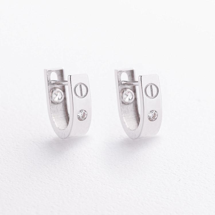 Золоті сережки "Love" з фіанітами с09705 від ювелірного магазину Онікс