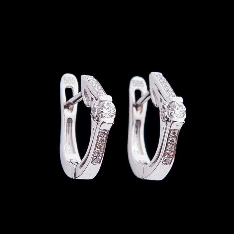 Золоті сережки з діамантами S00123E від ювелірного магазину Онікс