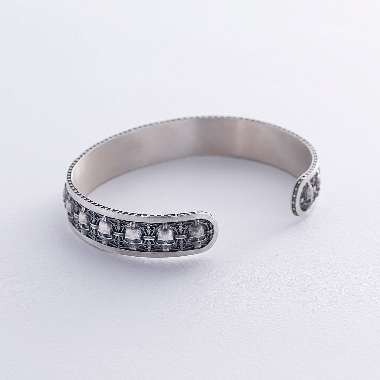 Чоловічий срібний браслет з черепами 1225 від ювелірного магазину Онікс - 2