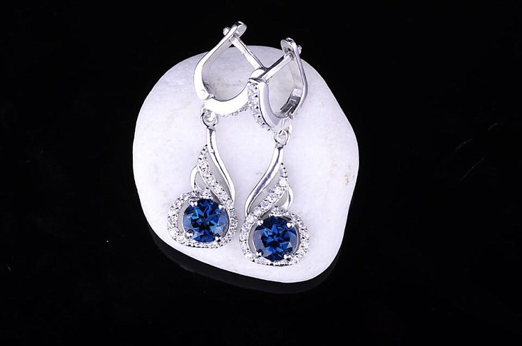 Женские серьги с  "Лондон голубым" топазом  (фианиты) 121393 от ювелирного магазина Оникс - 1