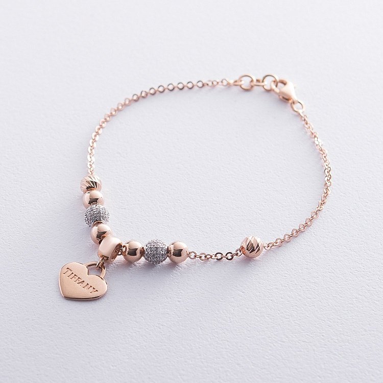 Золотий браслет "Сердечко" з фіанітами б03733 від ювелірного магазину Онікс