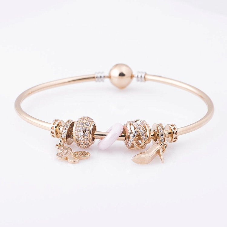 Золотой женский браслет с шармами (фианиты) б02726 от ювелирного магазина Оникс - 1