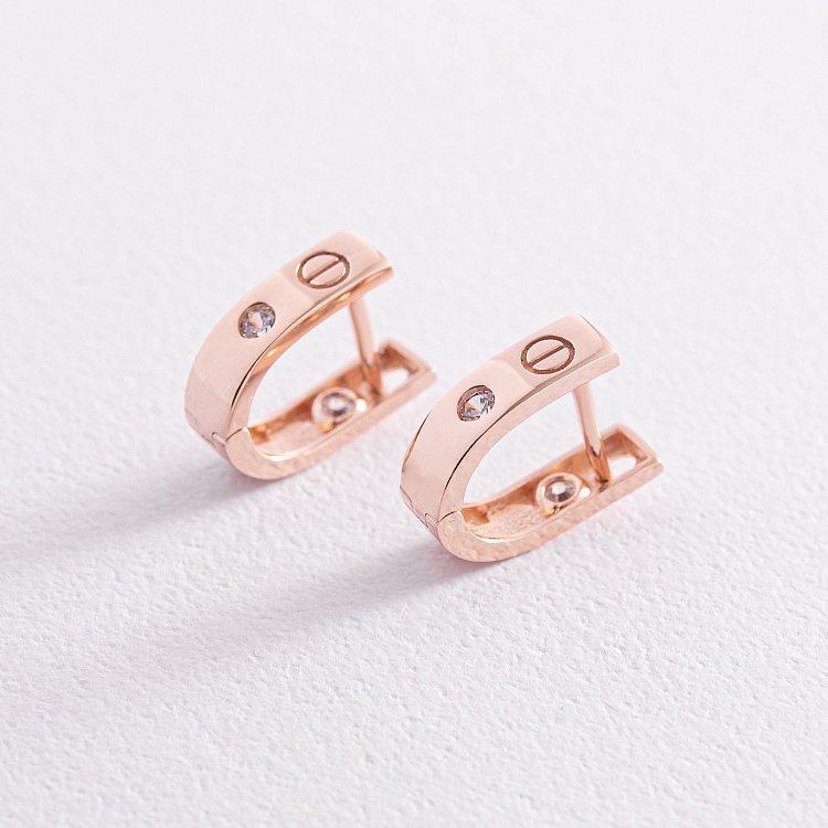 Золоті сережки "Love" з фіанітами с07859 від ювелірного магазину Онікс