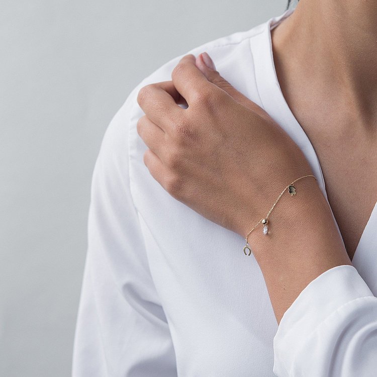 Золотий браслет з фіанітом б04247 від ювелірного магазину Онікс - 1