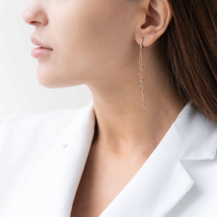 Золоті сережки на ланцюжку з кульками с07770 від ювелірного магазину Онікс - 1