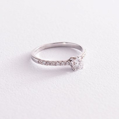 Заручальна золота каблучка з діамантами і сапфіром 101-10094(4.2)