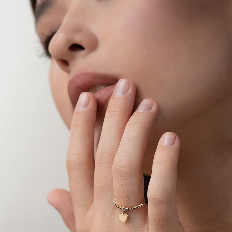 Золота каблучка "Сердечко" з фіанітом к06789 від ювелірного магазину Онікс - 1