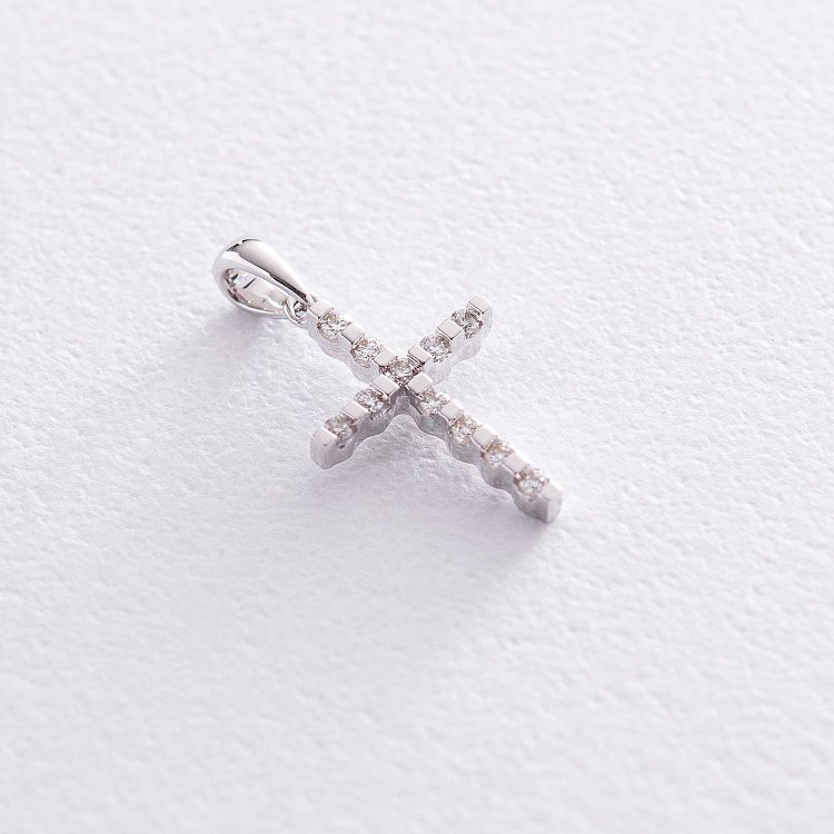 Золотий хрестик з діамантами пб0134mid Золотий хрестик з діамантами пб0134mid від ювелірного магазину Онікс