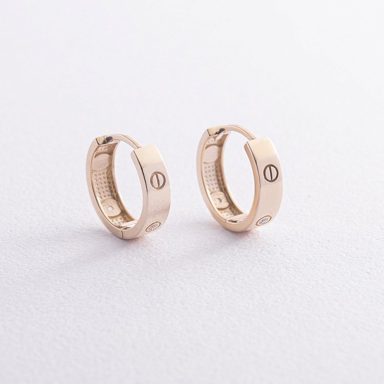 Сережки - кільця "Love" у жовтому золоті (фіаніти) с07652 від ювелірного магазину Онікс