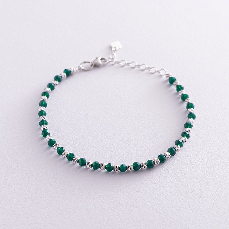 Срібний браслет з зеленими фіанітами 141374 від ювелірного магазину Онікс