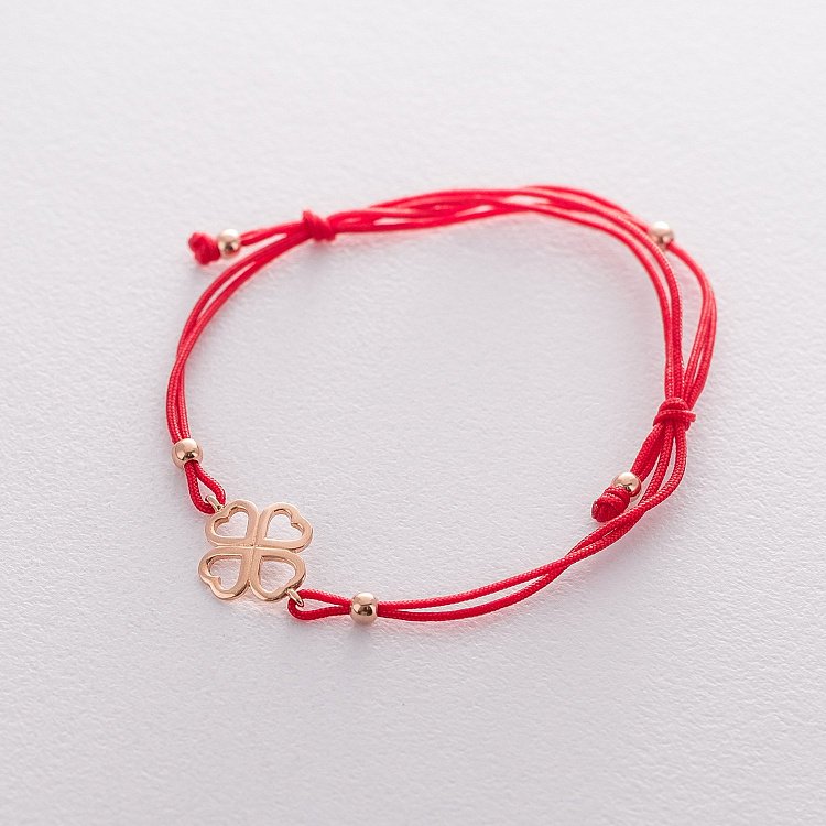 Браслет з червоною ниткою "Конюшина" б04208 від ювелірного магазину Онікс