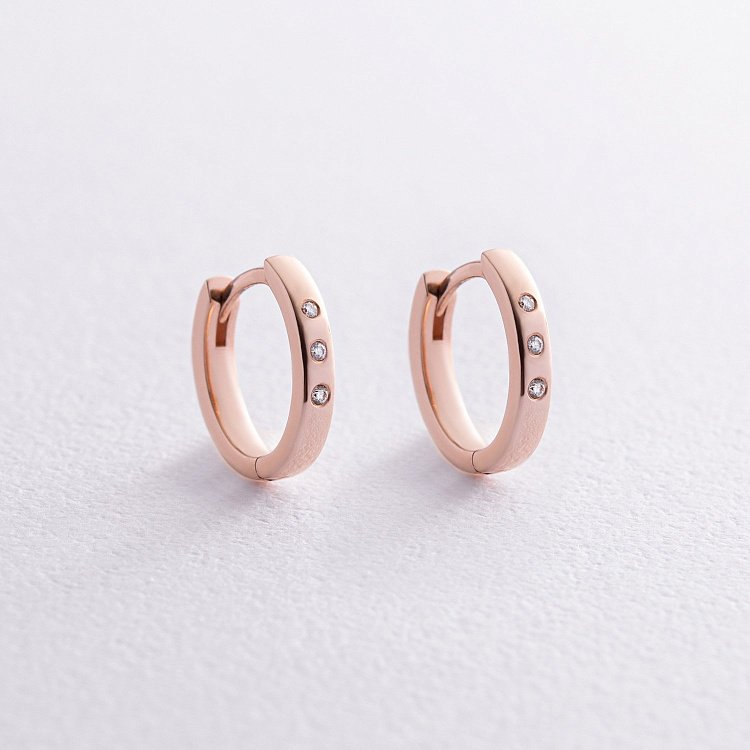 Золоті сережки - кільця з діамантами 310842421 від ювелірного магазину Онікс