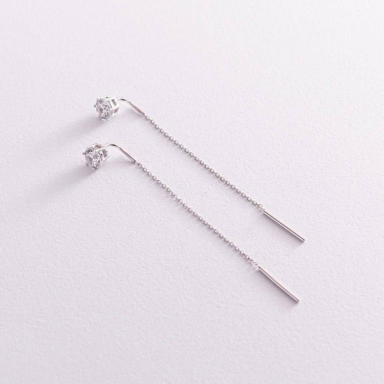 Золоті сережки - протяжки з фіанітами с07707 від ювелірного магазину Онікс