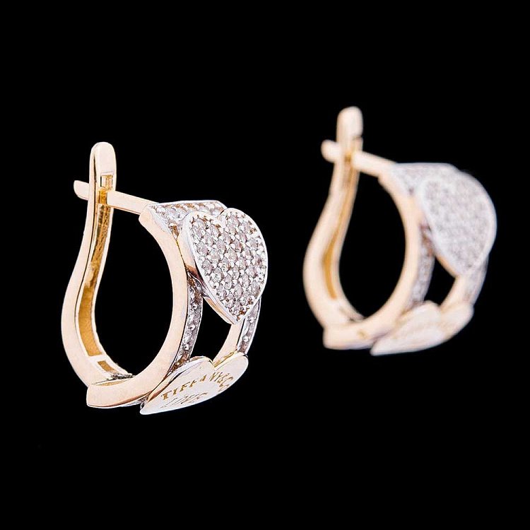 Золоті сережки з фіанітами с04257 від ювелірного магазину Онікс