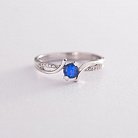 Золотое кольцо с синим сапфиром и бриллиантами кб0045 от ювелирного магазина Оникс