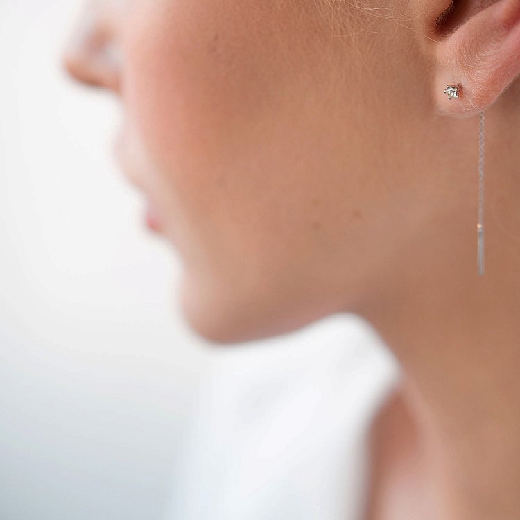 Сережки - протяжки в білому золоті (діаманти) 102-10086 від ювелірного магазину Онікс - 1