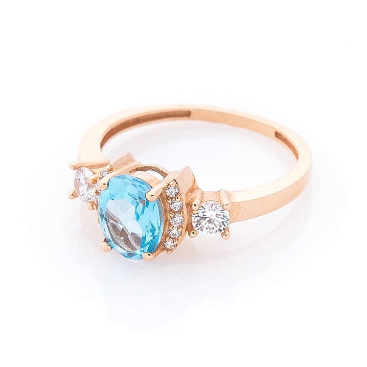 Золота каблучка (блакитний топаз, фіаніти) к04642 - 2 Золота каблучка (блакитний топаз, фіаніти) к04642 від ювелірного магазину Онікс - 2