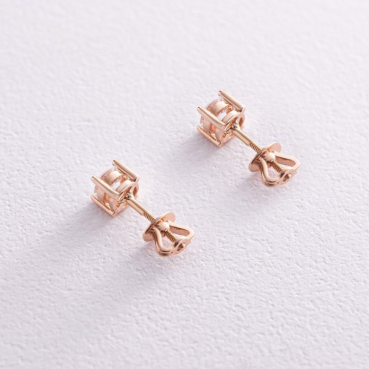 Золоті сережки - пусети (фіаніти) с02316 від ювелірного магазину Онікс - 1