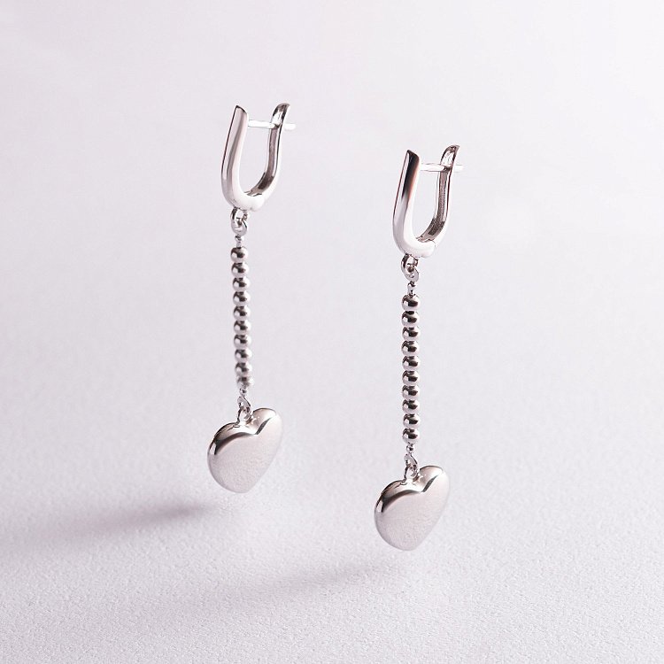 Срібні сережки "Сердечки" на ланцюжку 123146 від ювелірного магазину Онікс