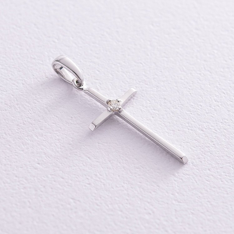 Золотой крестик с бриллиантом пб0249 Золотой крестик с бриллиантом пб0249 от ювелирного магазина Оникс