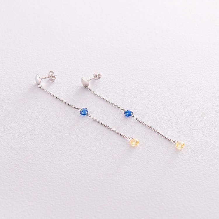 Висячі золоті сережки - пусети "Українка" (блакитні та жовті фіаніти) с08101 від ювелірного магазину Онікс