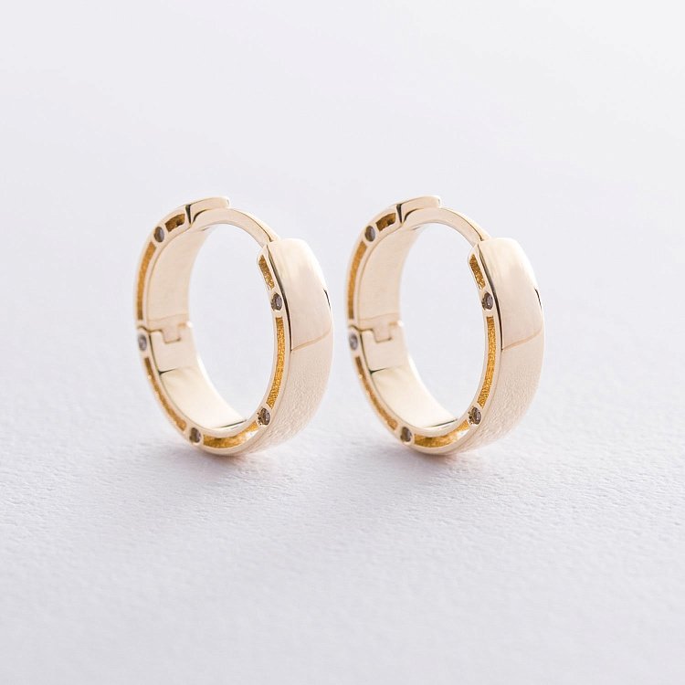 Золотые серьги "Кольца" с фианитами, диаметр: 17 мм с05226 от ювелирного магазина Оникс